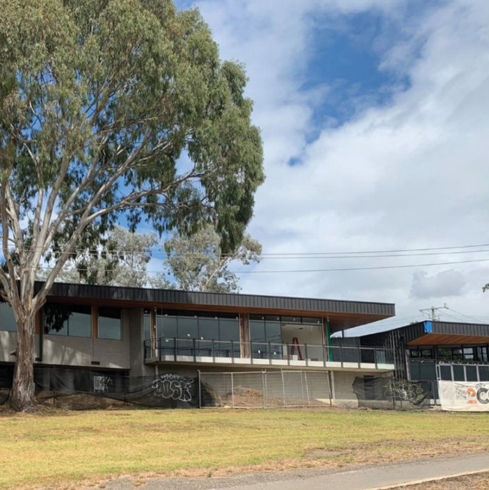 Vet Clinic and Café building: taken from Chandler Park looking up to the Vet Clinic and Café building with the Vet Clinic on the left hand side and the Café below on the right hand side