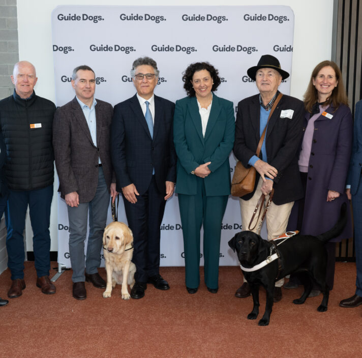 Dr Monique Ryan and Cr Nick Stavrou (centre) stands with various members of the Guide Dogs Victoria Board and GDV Client Cameron.