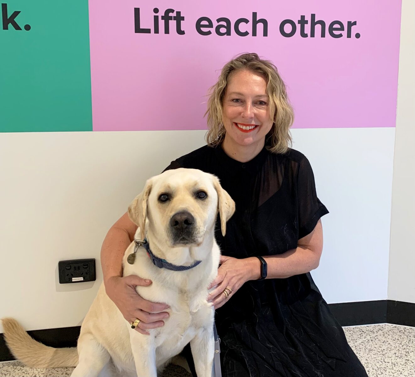 Kristy Richards with a guide dog