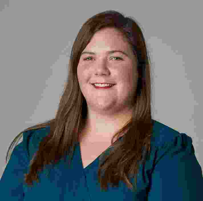 Headshot of Guide Dogs Victorias Chief Financial Officer, Rachel Knight. Rachel is looking at the camera smiling.