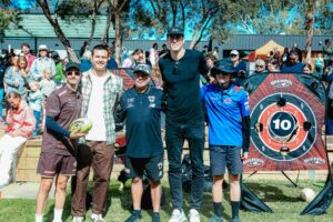 AFL players Jack Silvagni and Mason Cox and Blind AFL players at the handball competition. 